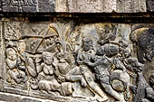 Prambanan - Ramayana reliefs of Shiva Temple. The rape of Sita by Rawana, disguised as a begging Brahman.  